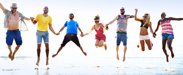 Diverse Beach Summer Friends Fun Jump Shot Concept